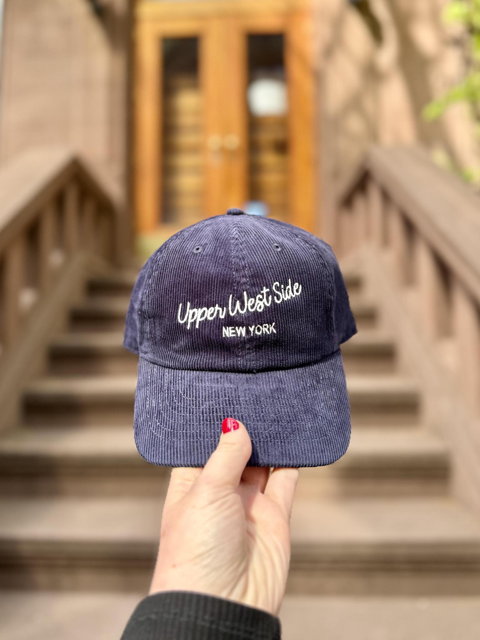 Navy blue cap with 'Upper West Side New York'.