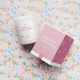 pink candle called 28th street flower market with peony and rose scent