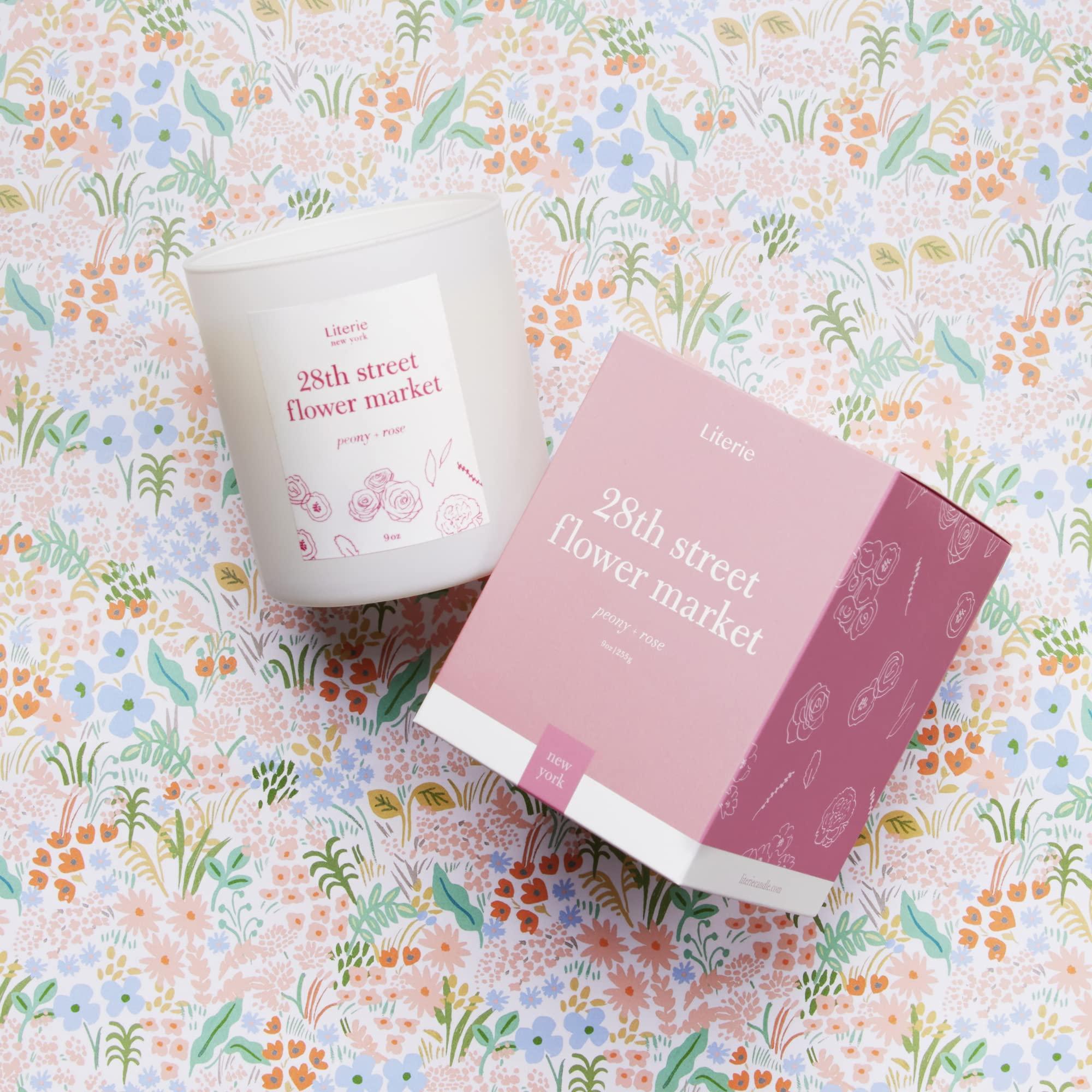 pink candle called 28th street flower market with peony and rose scent