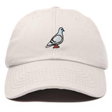 Beige cap with a pigeon emblem on a white background
