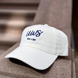 White cap with blue text that says UWS on a textured corduroy hat